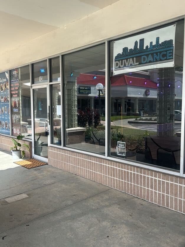 Duval Dance storefront with the skyline sign in the window